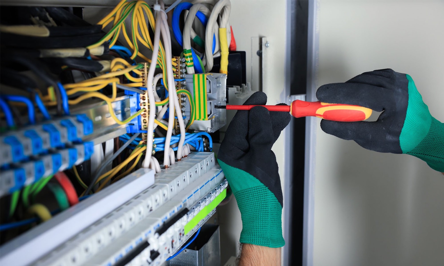 EIT engineer working on a commercial distribution board